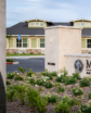 woman's headshot composite with a senior living facility exterior