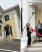 ribbon cutting and home exterior