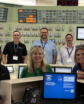 group in a control room