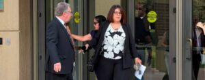 woman leaves a building