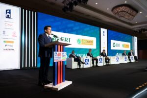 man speaking at a podium