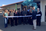 man speaking at ribbon cutting