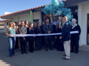 man speaking at ribbon cutting