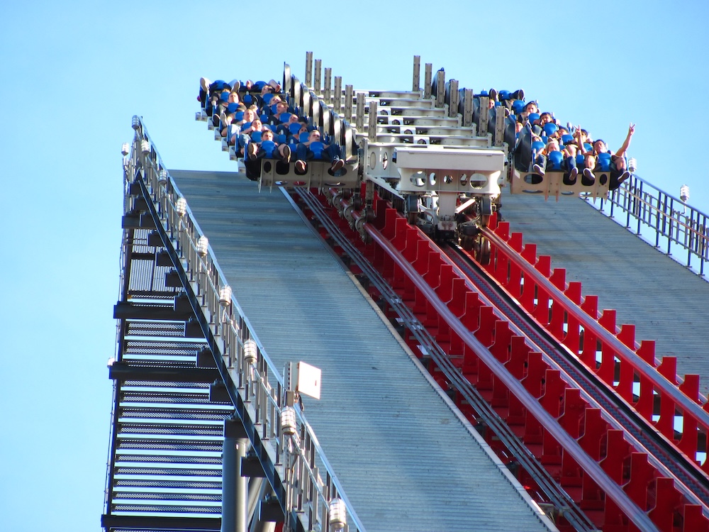 Riders crest a hill on the X2 roller coaster at Six Flags Magic Mountain.