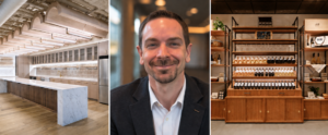 Corey Farnsworth, CEO of Architectural Wood Design, centered between examples of the company’s custom commercial millwork.