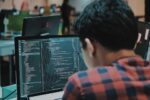 man at a computer terminal