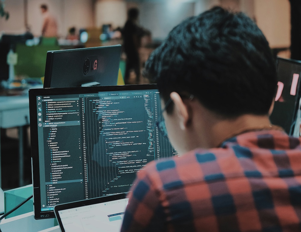 man at a computer terminal