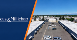 a company logo and aerial view of an industrial complex
