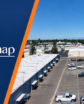 a company logo and aerial view of an industrial complex