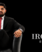 Lovepreet Chandi of Iron Key Real Estate seated beside the company’s logo.