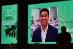 man's memorial photo on a screen