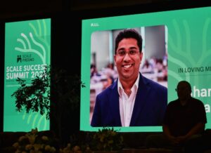 man's memorial photo on a screen