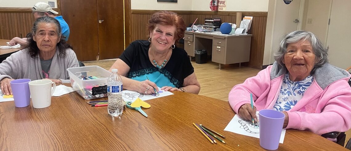 three women at a table