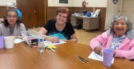 three women at a table
