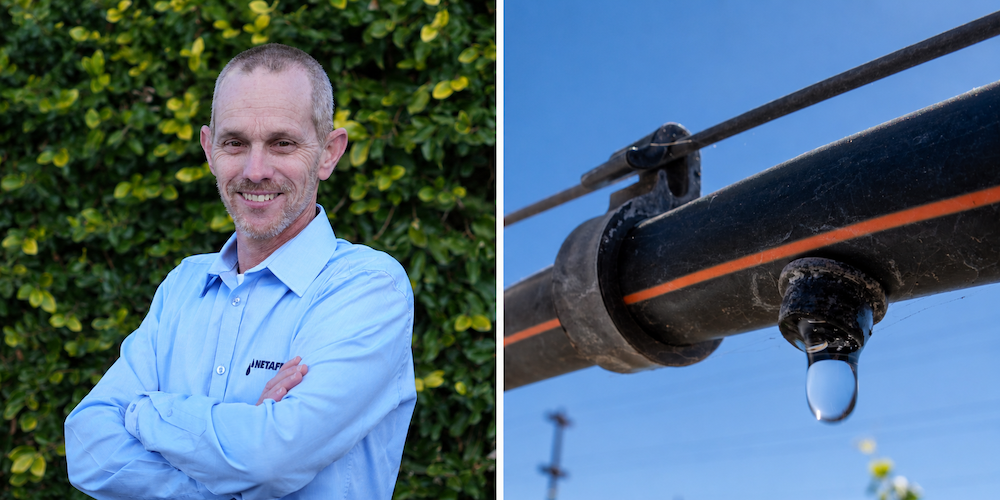 Dror Negbi of Netafim USA stands beside a close-up image of a drip irrigation outlet releasing water from an irrigation line.