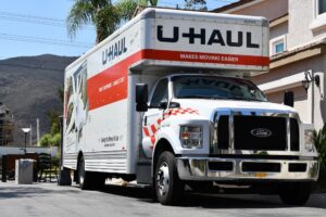 moving truck parked at a curb