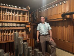 man in a organ chamber