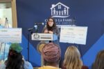 woman speaks at podium