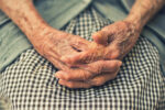 grandma's hands resting on her lap