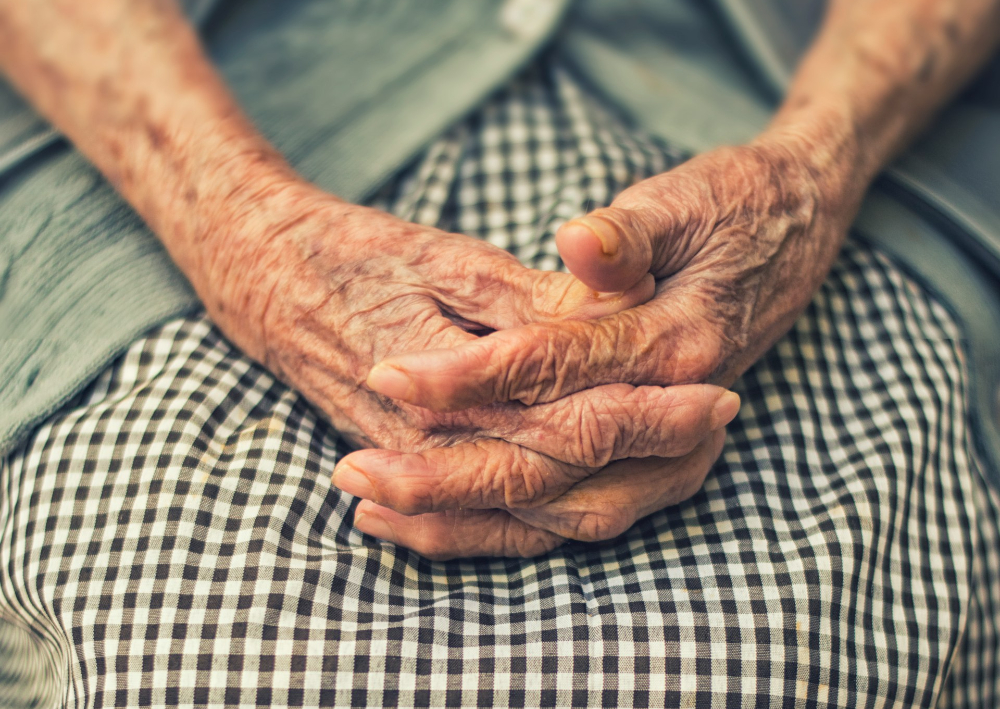 grandma's hands resting on her lap