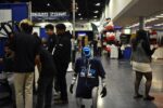 humanoid robot walking a convention floor
