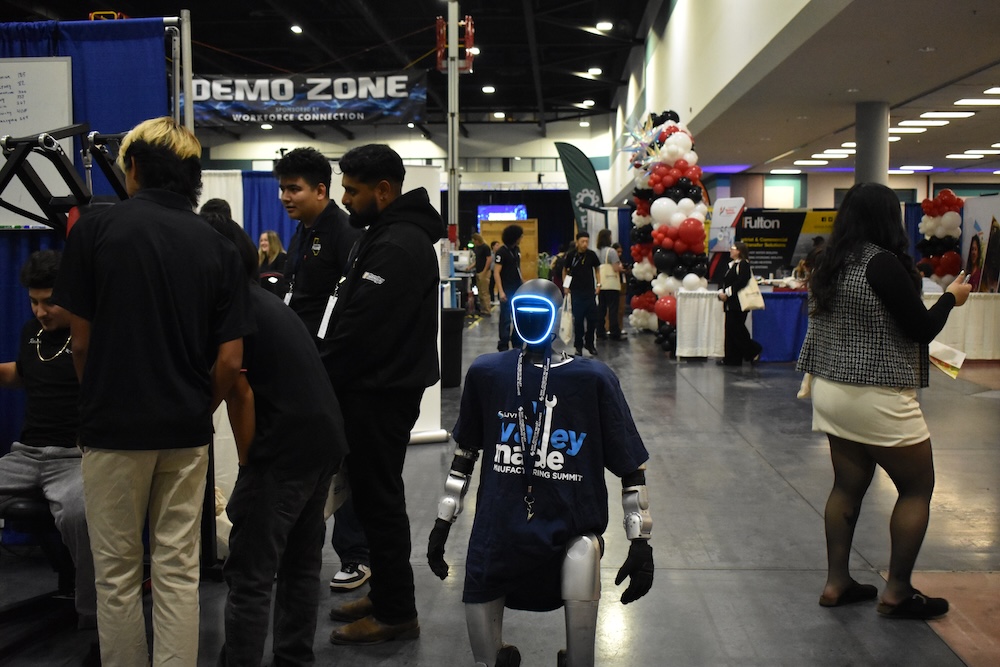 humanoid robot walking a convention floor